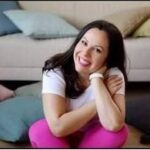 Happy customer smiling in her living room